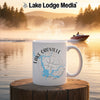 White mug with "Lake Oroville California" and compass design on a misty lake background.