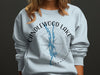 Light blue sweatshirt with "Candlewood Lake Connecticut" and compass graphic.