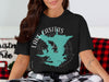 Black t-shirt with teal Lake Casitas California map graphic and compass.