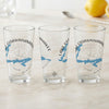 Three clear glasses with Lake Ossawinamake, Minnesota design and compass rose.