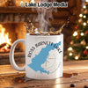 White mug with "Ross Barnett Lake Mississippi" map design, steaming coffee, cozy fireplace, and Christmas tree.