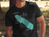 Black t-shirt with a teal outline map of Onondaga Lake and "NEW YORK" text.
