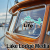 Flagstaff Life sticker on a boat window with Lake Lodge Media logo.