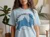 Light blue t-shirt with Mendenhall Lake map graphic and Alaska text.