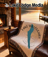 Woven throw with Lake Willoughby Vermont map design and compass rose.