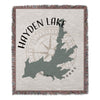 Woven throw with Hayden Lake Idaho map graphic and compass rose.