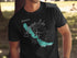 Black t-shirt with Chautauqua Lake map outline and compass graphic.