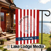 Garden flag with red and white stripes, compass, and "The Smith Family".