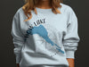 Light blue sweatshirt with Bow Lake Alberta map and compass design.