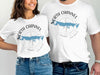 White t-shirts with "North Channel Ontario" and compass map graphic.
