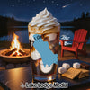 Glass with ice cream, s'mores ingredients, campfire, and lake scene.