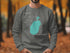 Grey sweatshirt with "Beautiful Lake Pulaski Minnesota" and teal lake outline.