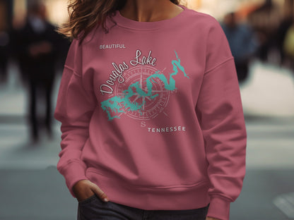 Pink sweatshirt with "Douglas Lake Beautiful Tennessee" and compass design.