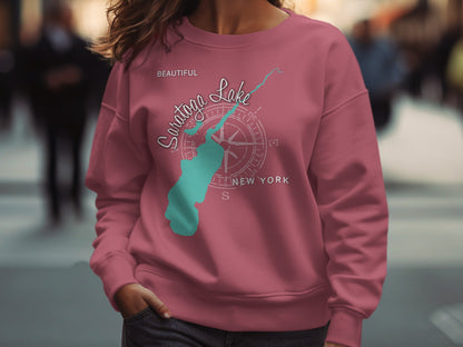 Pink sweatshirt with "Saratoga Lake" and compass rose graphic.