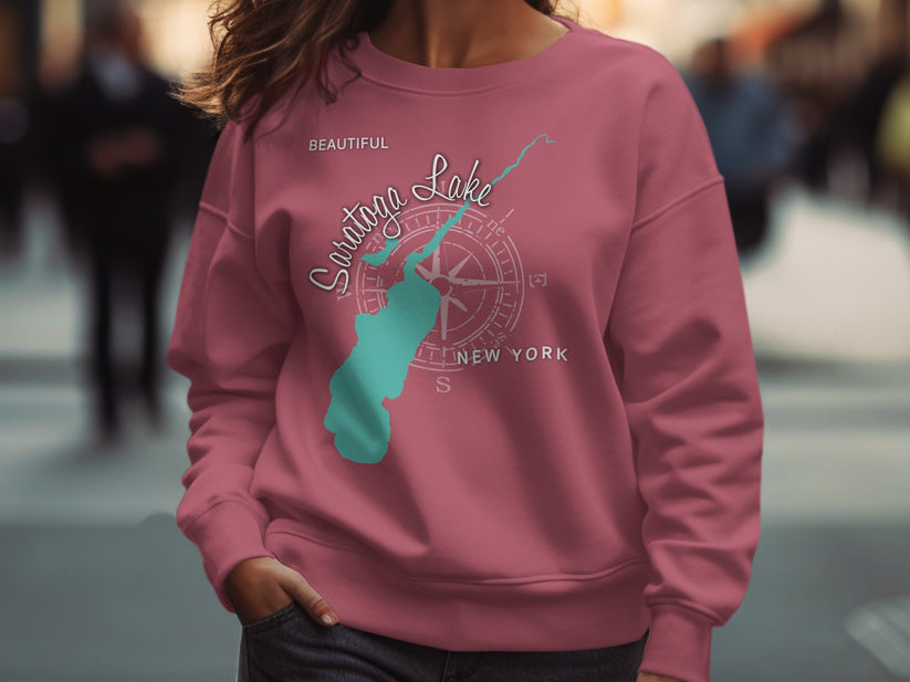 Pink sweatshirt with "Saratoga Lake" and compass rose graphic.