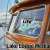 Sticker on boat window reads "Seminole Life", with smaller text "Lake Lodge LLC".