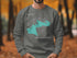 Gray sweatshirt with "Merrymeeting Lake NEW HAMPSHIRE" map graphic.