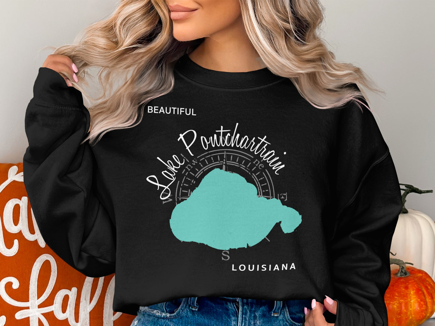 Black sweatshirt featuring "Lake Pontchartrain" map and compass design with "Louisiana."