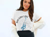 White t-shirt with Balsam Lake, compass, and Ontario graphic text.