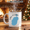 White mug with "Lake Pulaski Minnesota" design and splashing liquid.