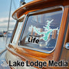 Hartwell Life decal on boat window next to Lake Lodge Media text.
