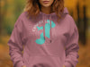 Pink hoodie with turquoise Canobie Lake map graphic and text.