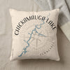 Cream pillow with Chickamauga Lake map and compass design in black and blue.