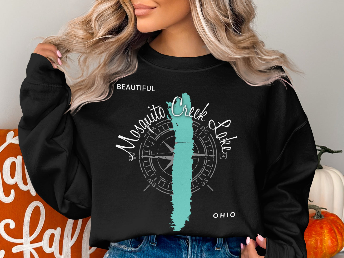 Black sweatshirt with "Beautiful Mosquito Creek Lake Ohio" text and compass design.