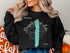 Black sweatshirt with "Beautiful Mosquito Creek Lake Ohio" text and compass design.