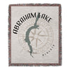 Woven blanket with Abraham Lake shape, compass rose, and text "ALBERTA".