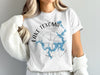 White t-shirt with Lake Texoma map and compass design in blue and gray.