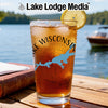 Glass of iced tea with lemon, Wisconsin outline and compass graphic, Lake Lodge Media logo.
