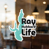 Ray Hubbard Life sticker with turquoise outline and black text on glass.