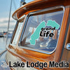 Teal "Grand Life" logo on boat window, "Lake Lodge Media" text below.