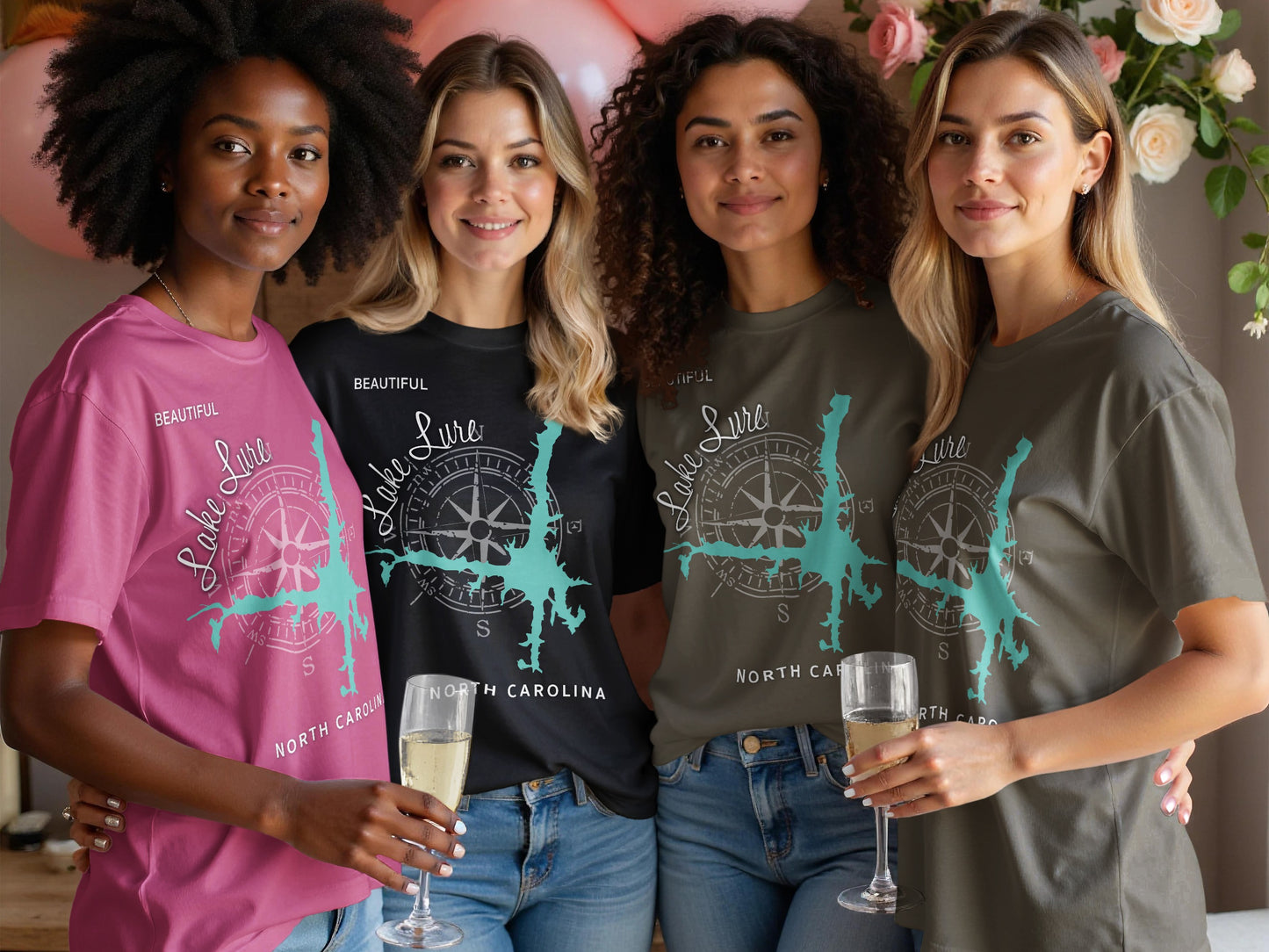 Four women in t-shirts with compass design and "Lake Lure North Carolina" text.