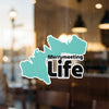 Turquoise map outline graphic with text "Merrymeeting Life" and copyright Lake Lodge Media LLC.