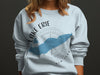White sweatshirt with blue Lake Erie map and compass graphic reading "LAKE ERIE NEW YORK".