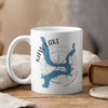 White mug with blue Kaw Lake map, compass, and "Oklahoma" text.