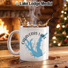 White mug with Calaveras Lake Texas map and compass design, steaming hot beverage.