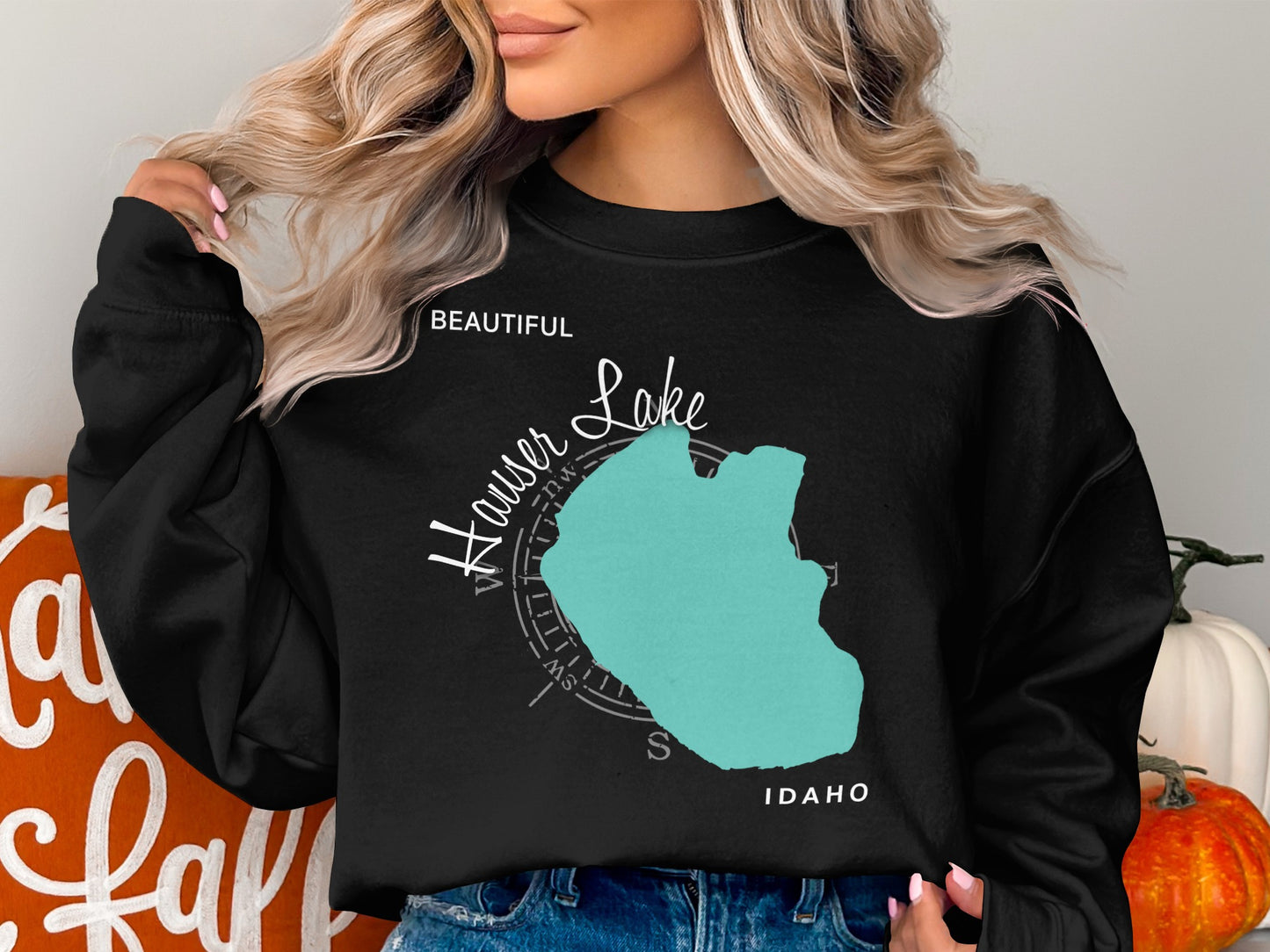 Black sweatshirt with "Beautiful Hauser Lake Idaho" text and lake outline.