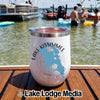 A white insulated tumbler featuring a Lake Kissimmee, Florida graphic sits on a wooden deck with boats and people in the background.