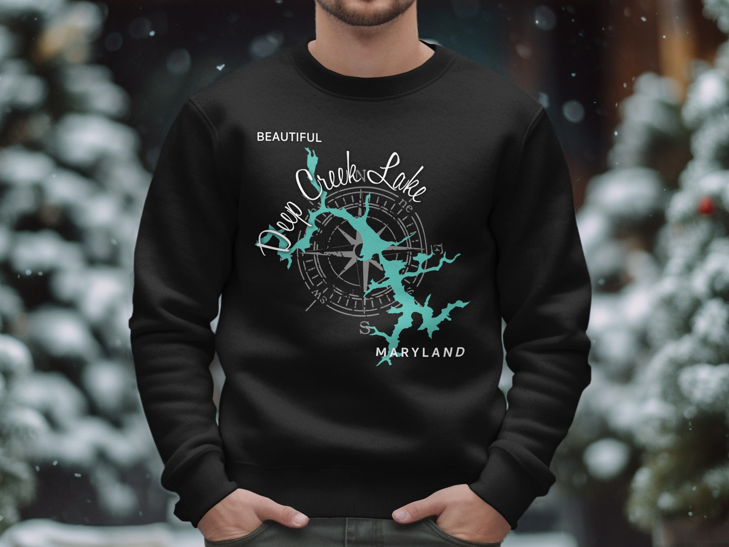 Black sweatshirt with turquoise Deep Creek Lake map and compass graphic.