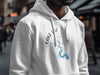 White hoodie with Lake LBJ, Texas map, and compass graphic.