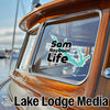 Sam Rayburn Life decal on a boat window, with "Lake Lodge Media" text.