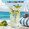 Glass with Lake Michigan map design on a beach with sailboat and sunglasses.