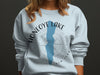 Light blue sweatshirt with Honeoye Lake New York map and compass graphic.