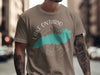 Brown t-shirt with teal Lake Ontario map on compass graphic.