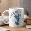 White mug with Moss Lake map and compass design, "North Carolina" text.