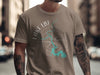 Taupe t-shirt with compass graphic and Lake LBJ Texas map illustration.