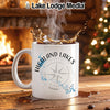 White mug with "Highland Lakes Texas" text and compass design, hot coffee splashing.